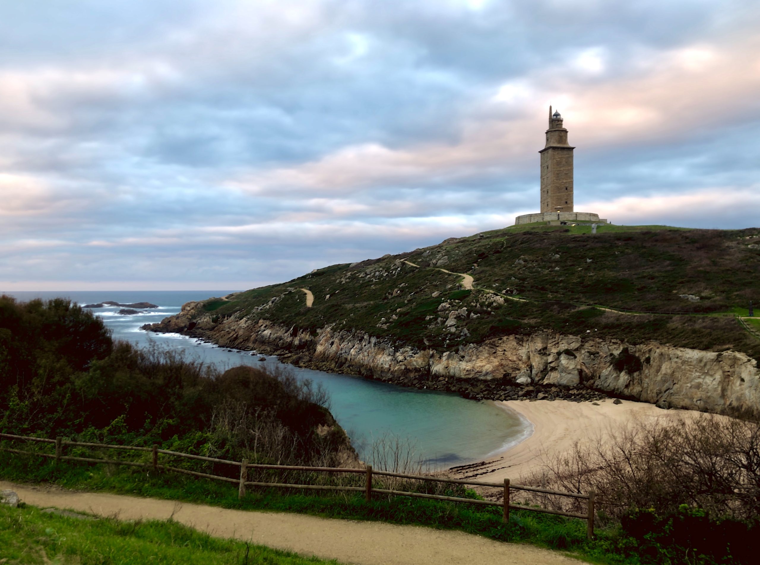 The oldest still functioning lighthouse, Tower of Hercules, atop a hill by the ocean in A Coruña, Galicia, Spain.